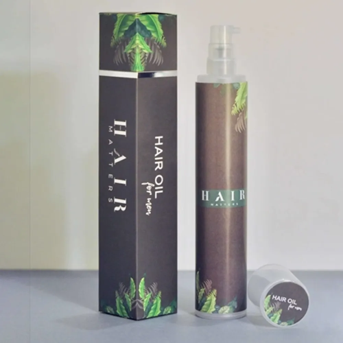 printed hair oil packaging